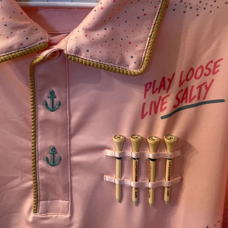 Close-up of the tee bandolier, rope trim and anchor buttons