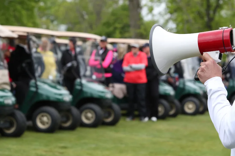 Golf tournament outing group on the course