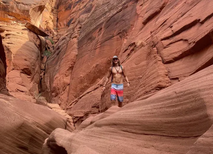 Austin hiking across the rocks