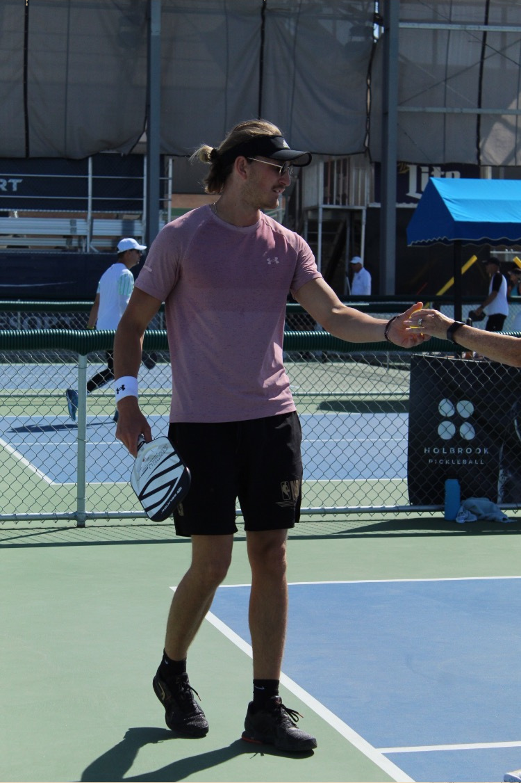 Austin playing pickleball